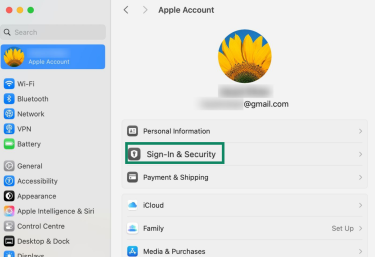 Visual showing where to click on macOS to access Sign-In & Security