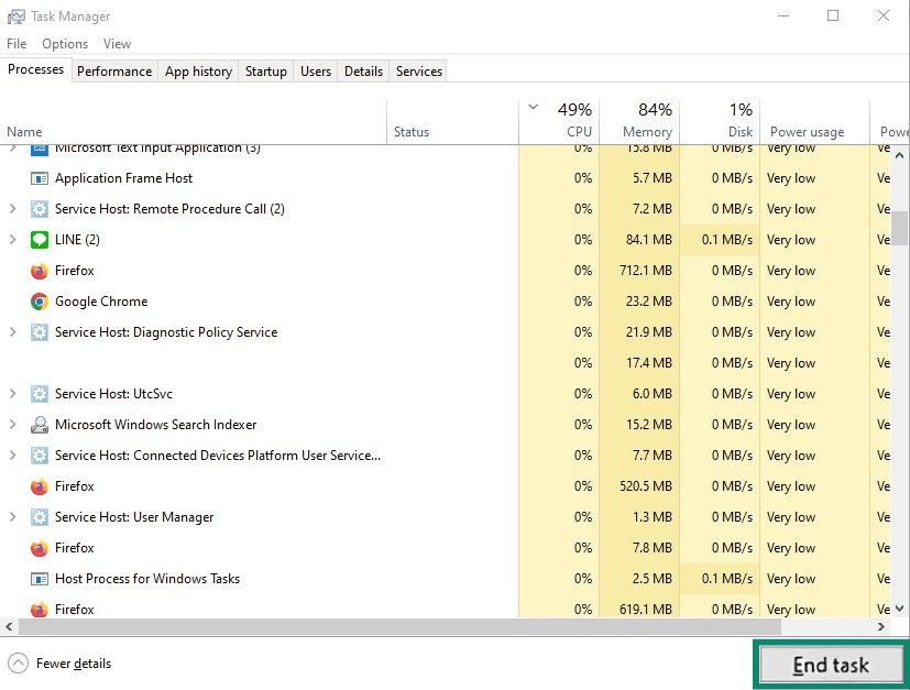 Windows Task Manager with the End task button highlighted.