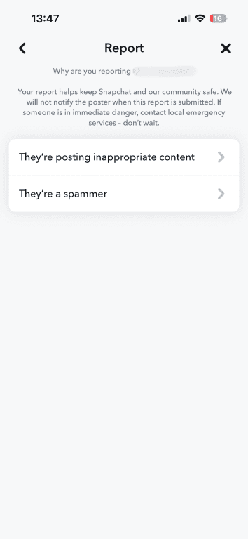 Snapchat report screen asking why the user is reporting, with options for inappropriate content or spam.